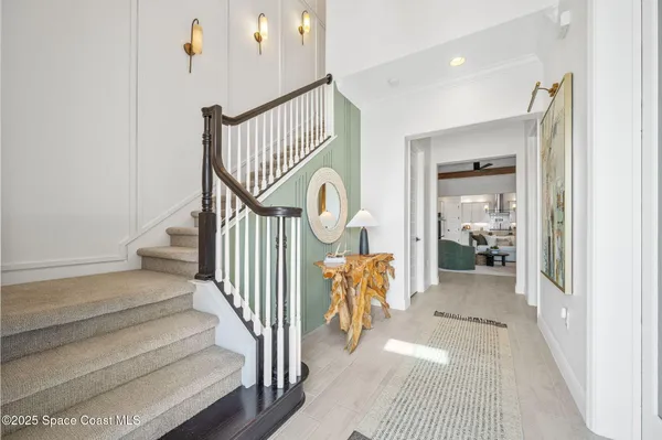 a kitchen with stainless steel appliances granite countertop a sink and cabinets
