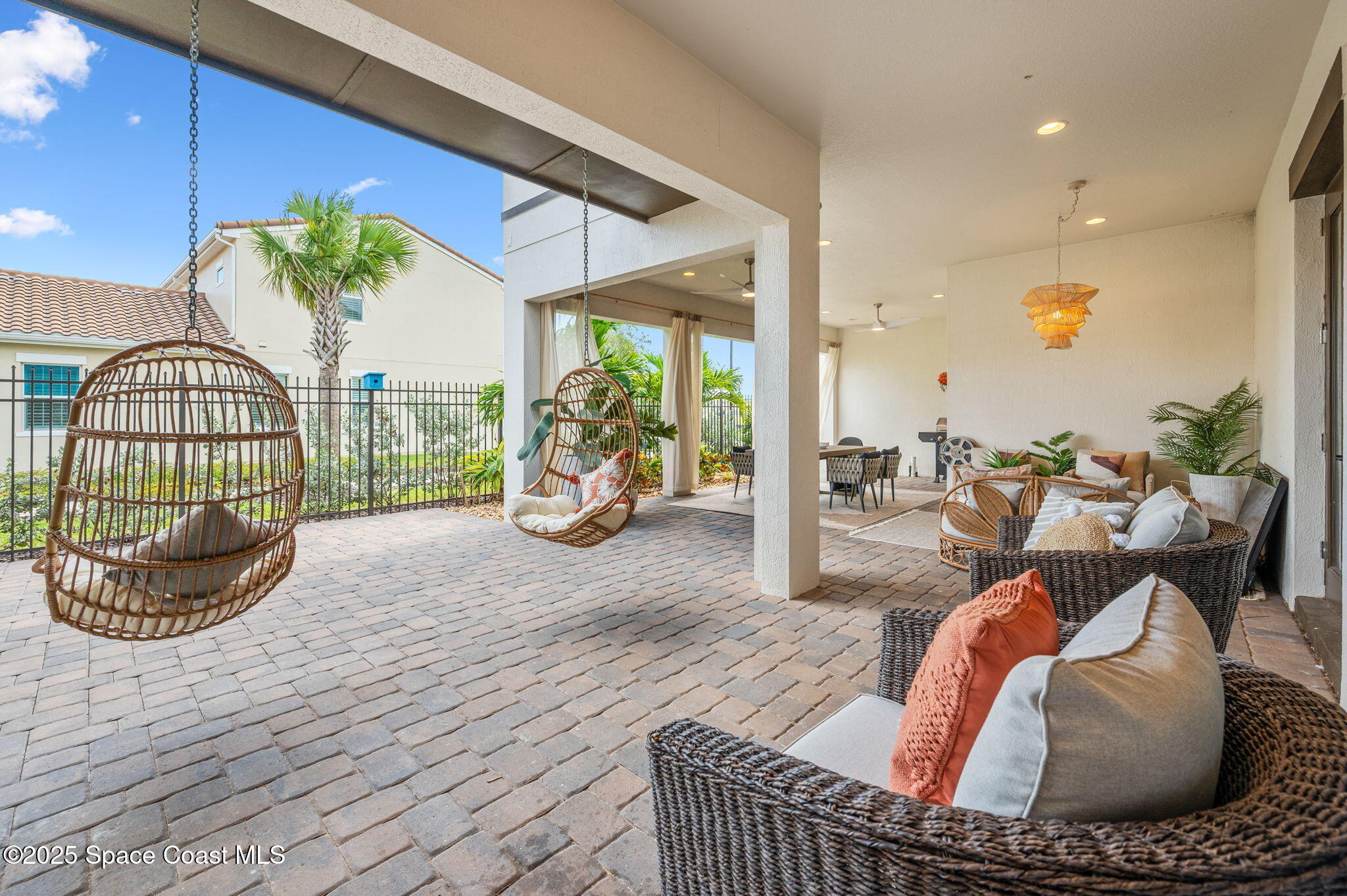 2444 Addison Drive Melbourne, FL 32940 - Photo 52 of 93 a living room with furniture and a garden