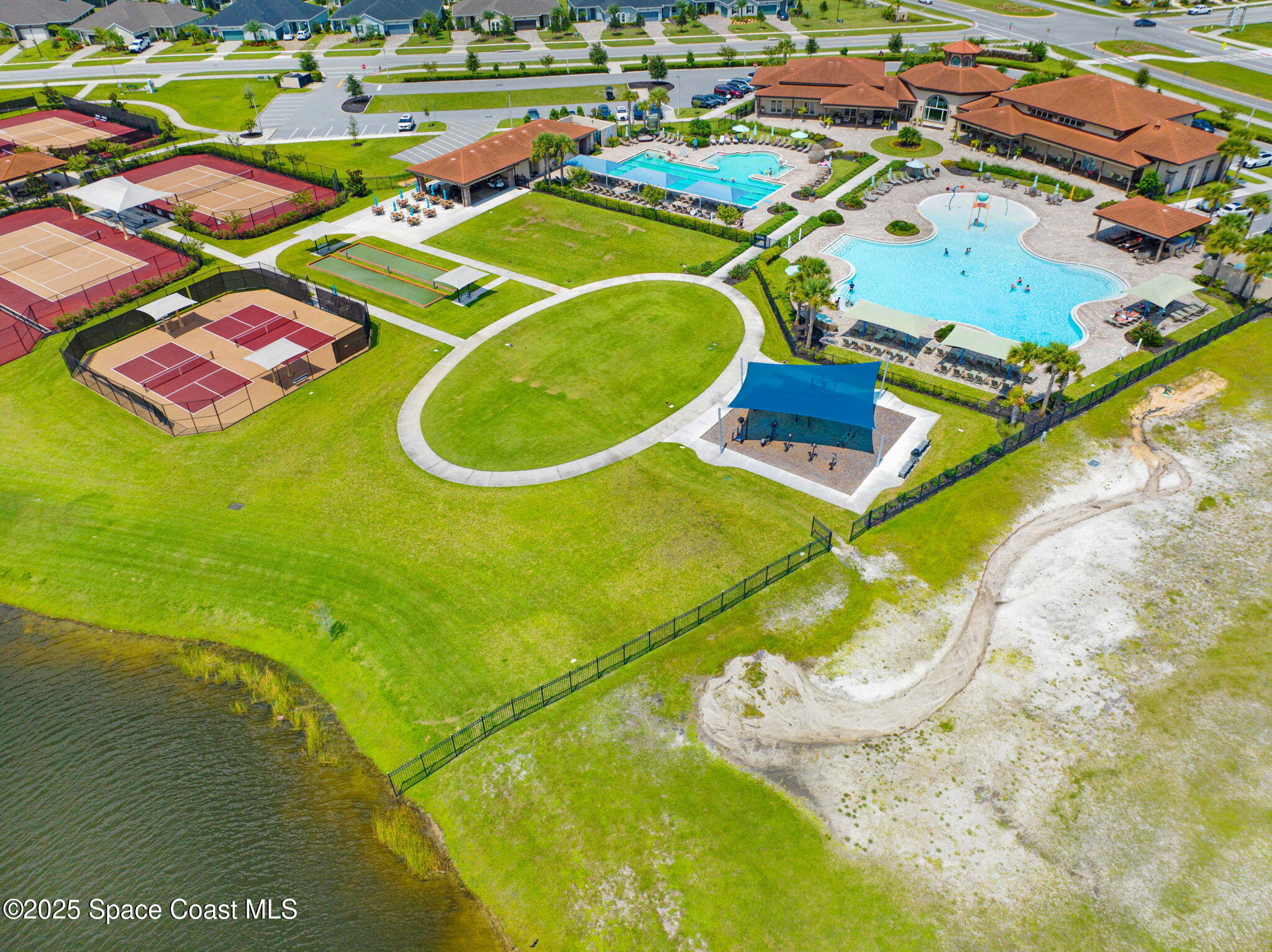 2444 Addison Drive Melbourne, FL 32940 - Photo 67 of 93 an aerial view of a pool patio swimming pool and outdoor space