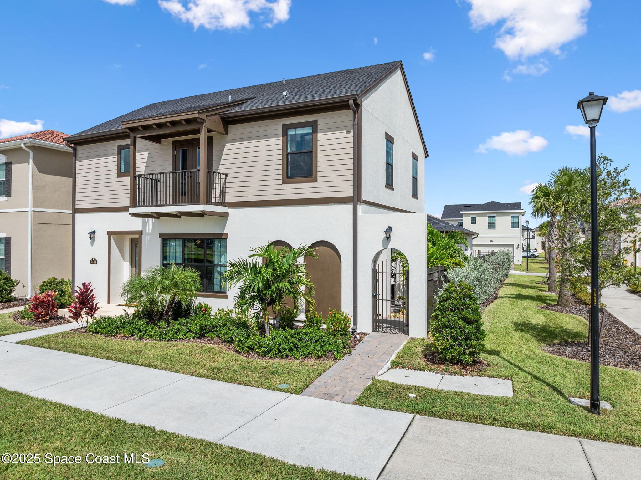 2444 Addison Drive Melbourne, FL 32940 - Photo 73 of 93 a front view of a house with a garden