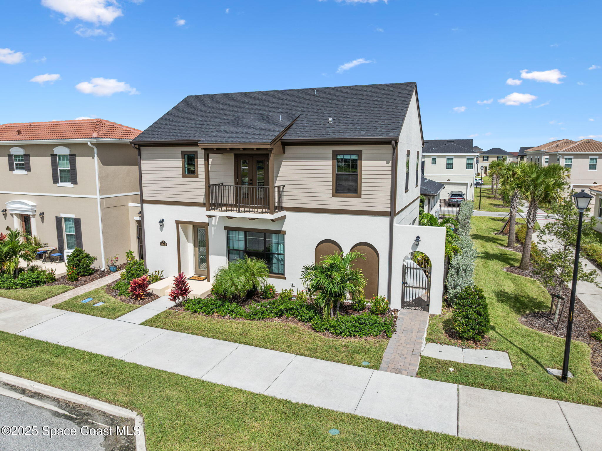 2444 Addison Drive Melbourne, FL 32940 - Photo 78 of 93 a front view of a house with a yard