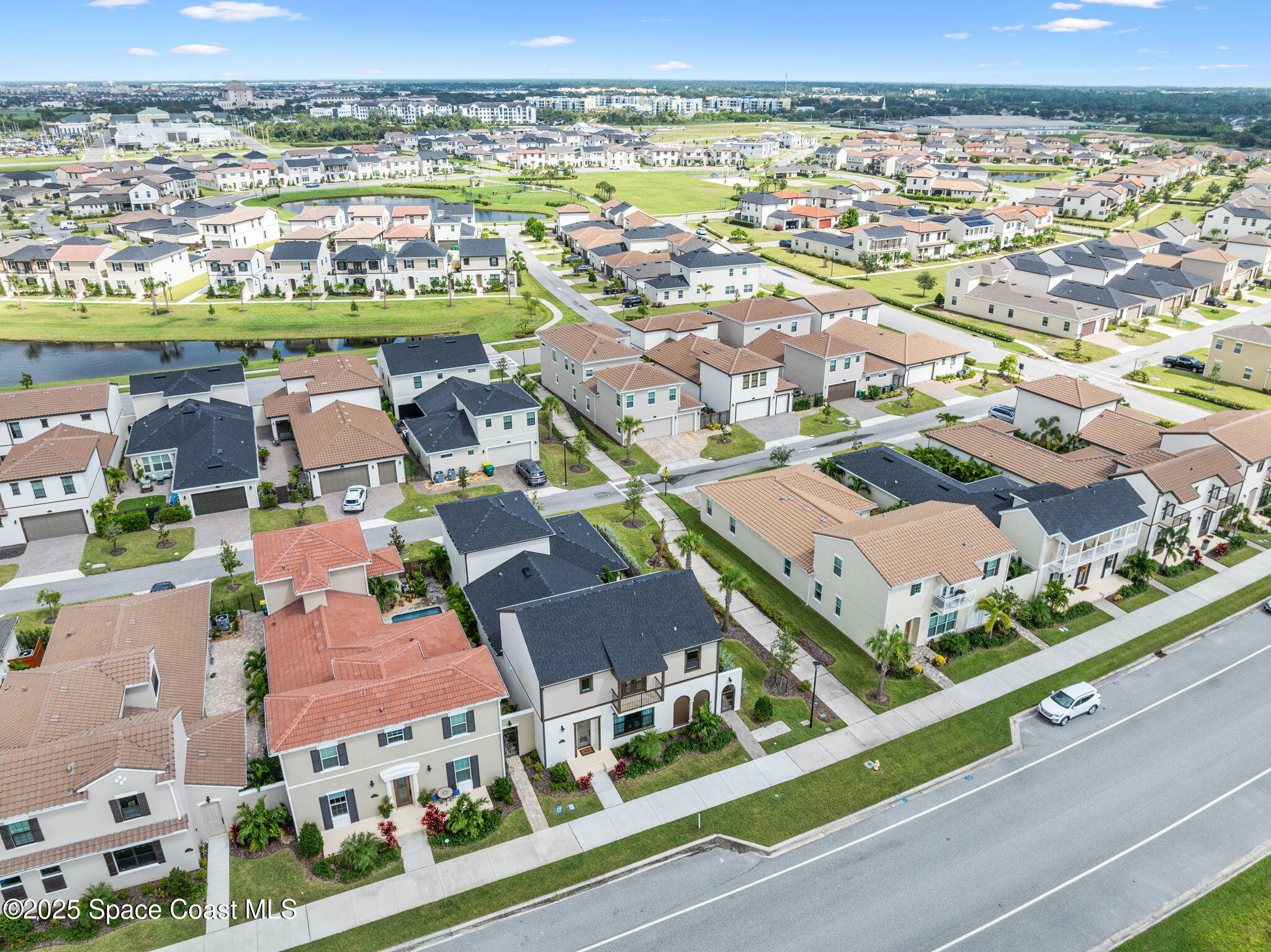 2444 Addison Drive Melbourne, FL 32940 - Photo 84 of 93 an aerial view of residential houses with outdoor space