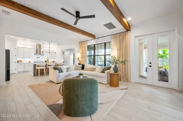 a close view of a stove a microwave and wooden floor