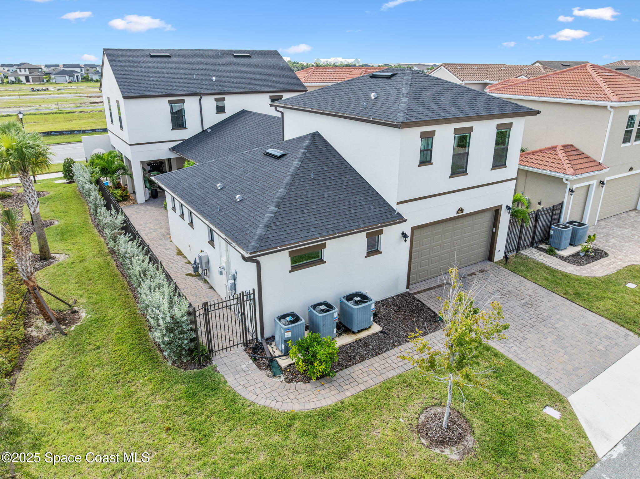 2444 Addison Drive Melbourne, FL 32940 - Photo 92 of 93 an aerial view of a house with a yard