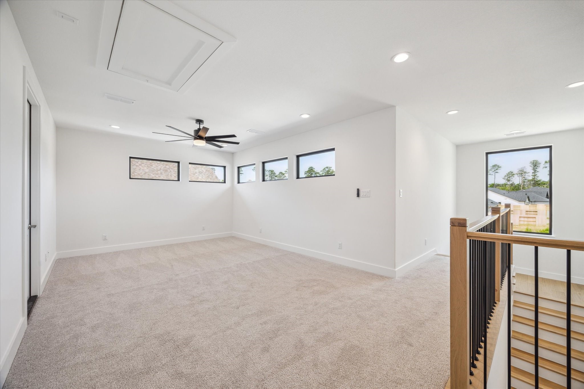 403 Venado View Court Conroe, TX 77304 - Photo 20 of 39 Upstairs loft space without virtual staging.