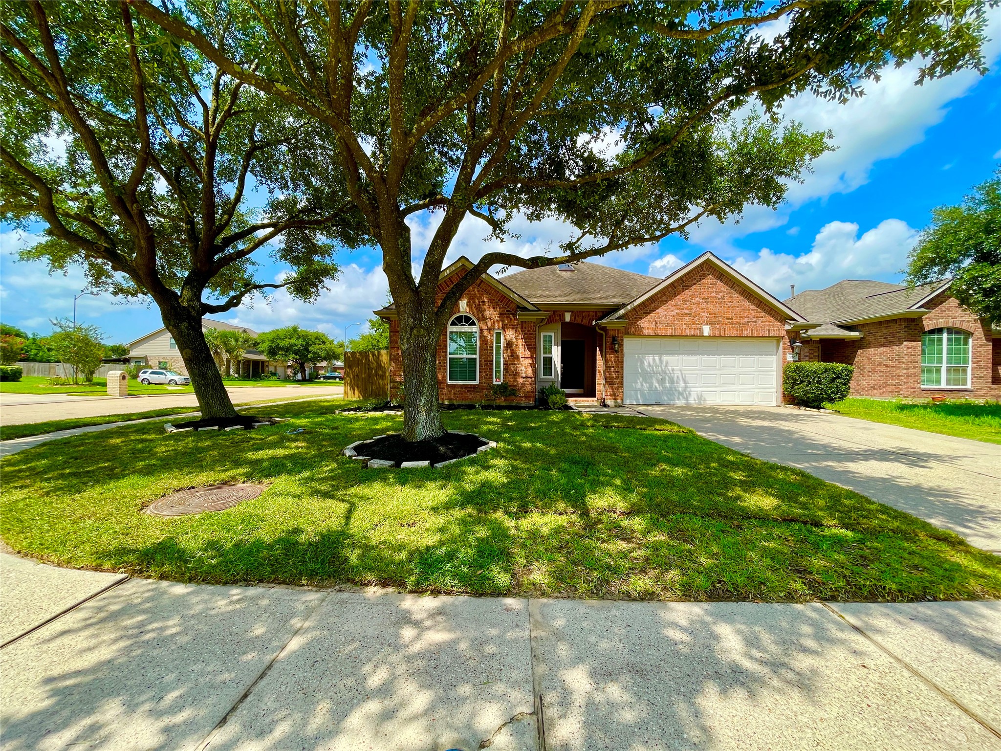 Corner Lot, sidewalks, mature shade trees and zoned to Excellent Klein Schools.