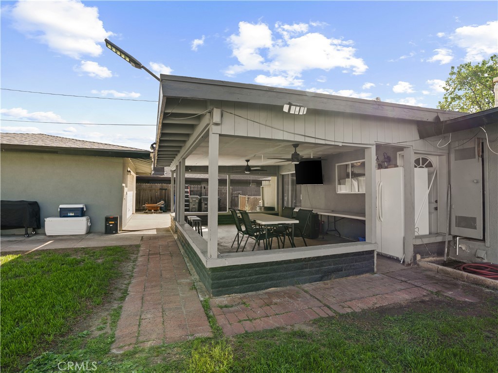 1455 North Alice Avenue Rialto, CA 92376 - Photo 5 of 23 a view of a porch with furniture and a yard
