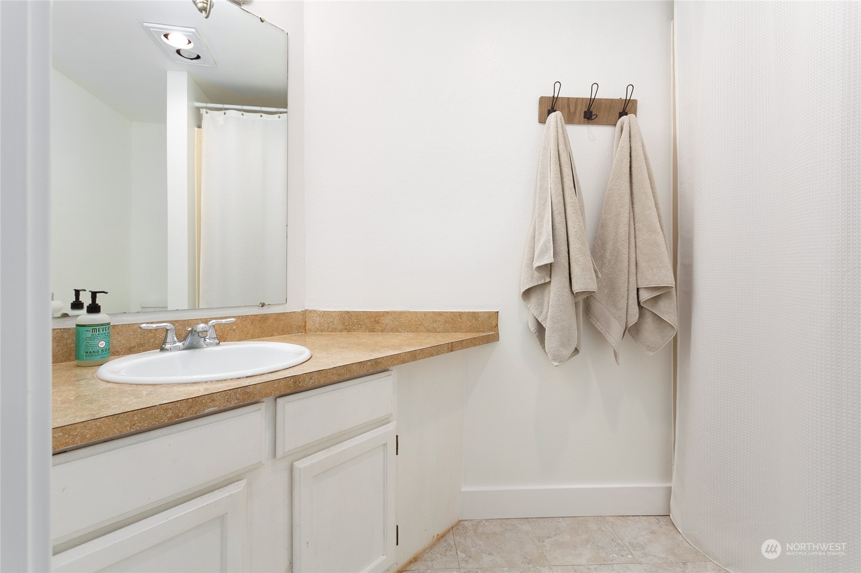 3835 Spring Coulee Road Bellingham, WA 98226 - Photo 14 of 30 a bathroom with a sink and a mirror