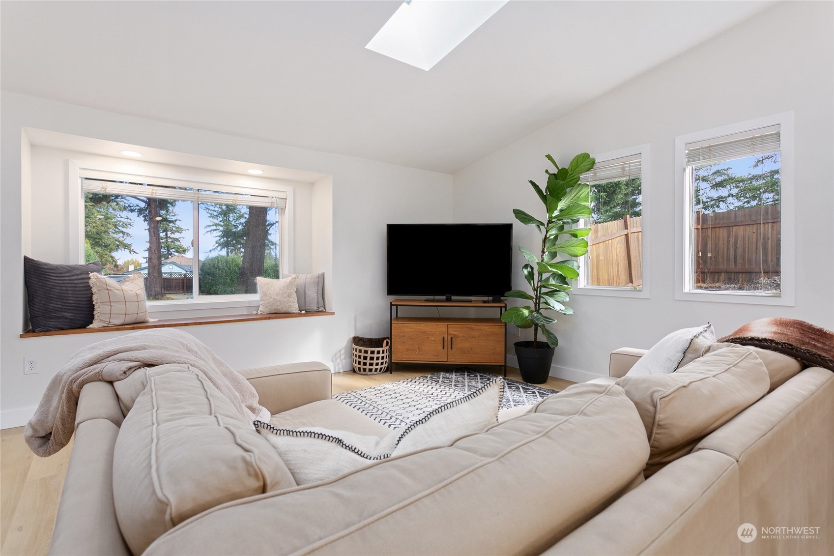 3835 Spring Coulee Road Bellingham, WA 98226 - Photo 2 of 30 a living room with furniture and a flat screen tv