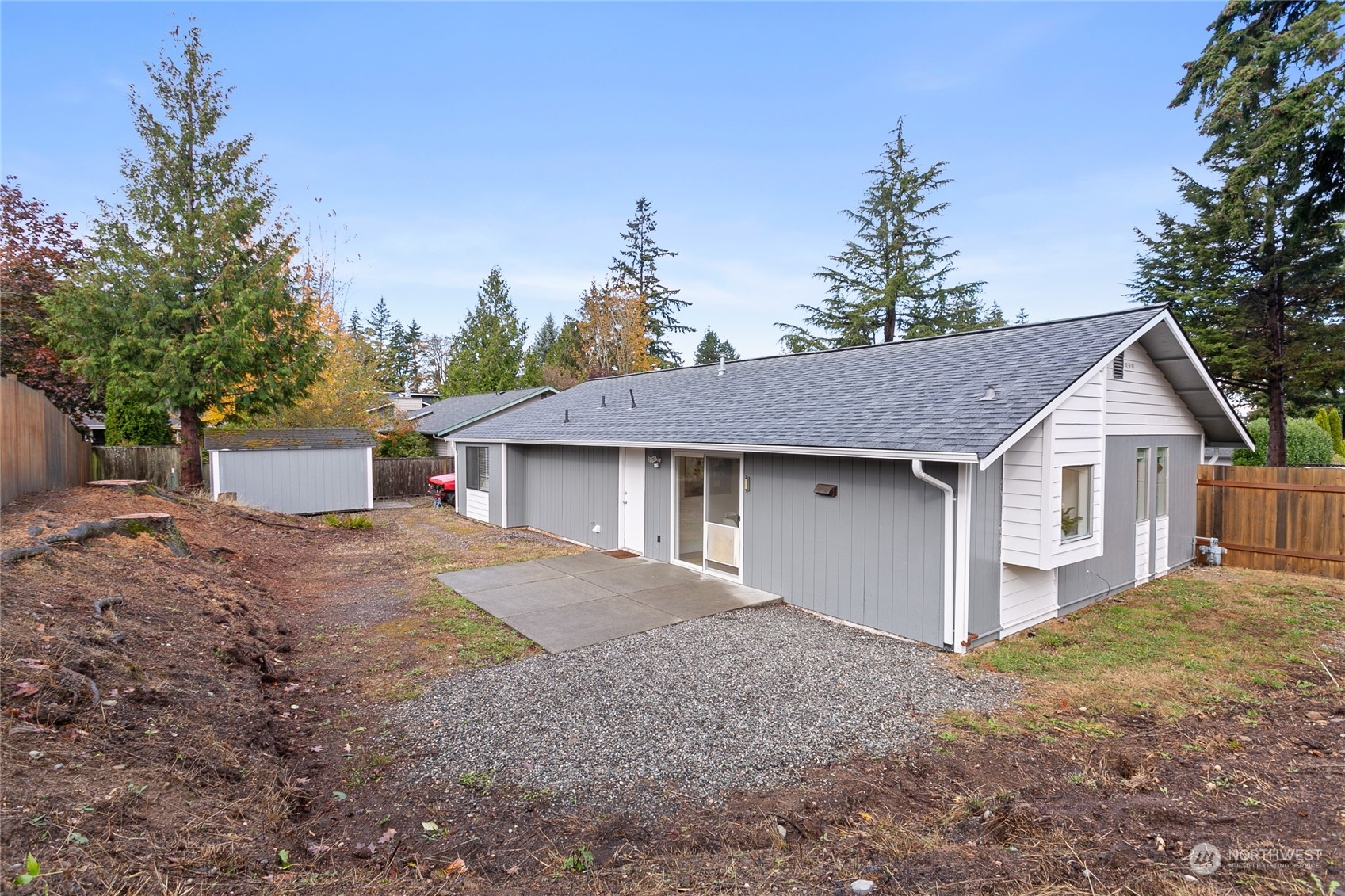 3835 Spring Coulee Road Bellingham, WA 98226 - Photo 25 of 30 a view of a house with a yard and potted plants