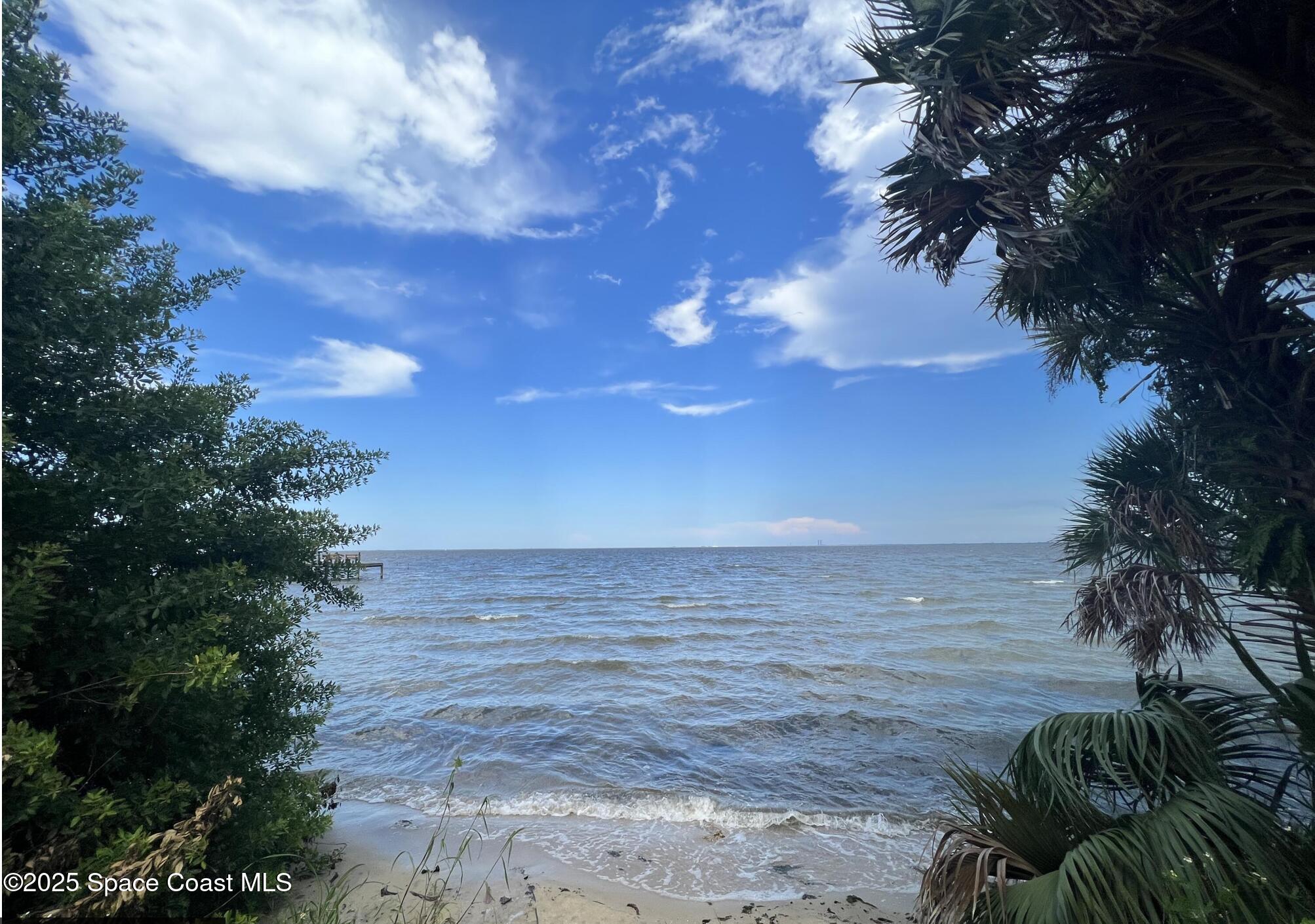 0 Riveredge Drive Titusville, FL 32780 - Photo 13 of 14 a view of an ocean and beach