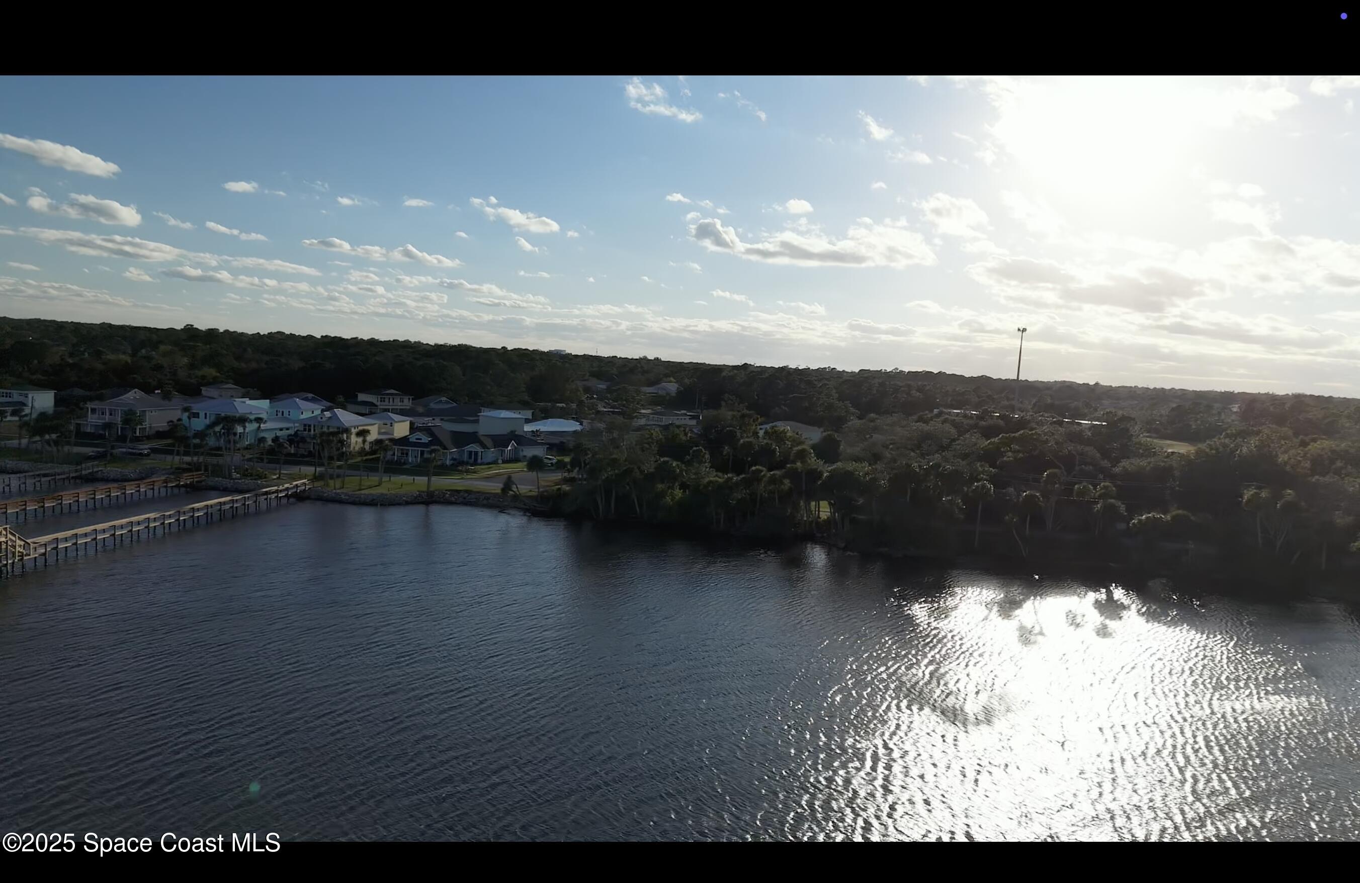 0 Riveredge Drive Titusville, FL 32780 - Photo 6 of 14 a view of swimming pool and lake