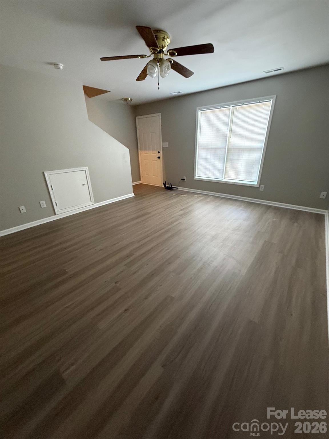1009 22nd Street Northeast Hickory, NC 28601 - Photo 2 of 8 a view of an empty room with a window