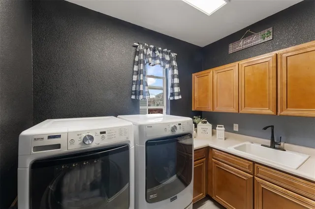 a bathroom with a toilet a sink and a mirror