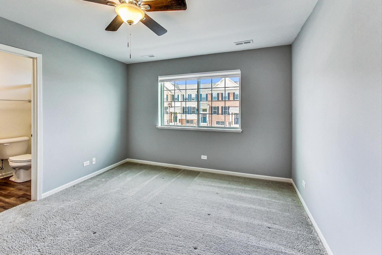 1663 Kraft Avenue Batavia, IL 60510 - Photo 17 of 47 a view of an empty room with a window