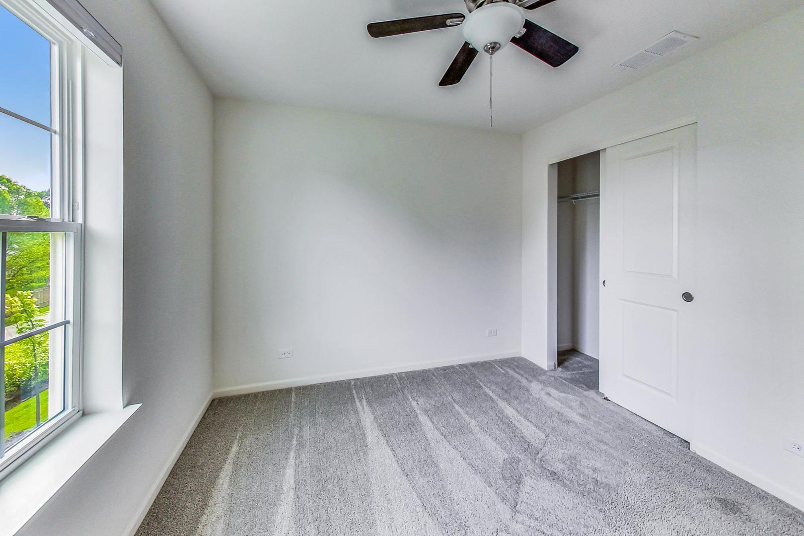 1663 Kraft Avenue Batavia, IL 60510 - Photo 24 of 47 a view of room with window and ceiling fan