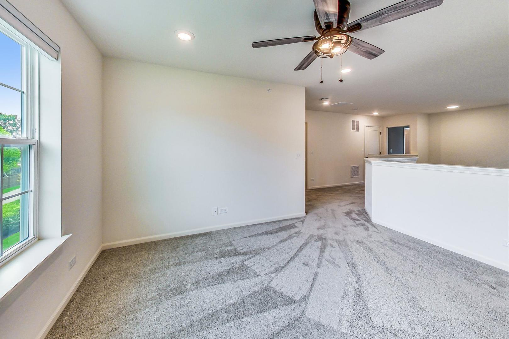 1663 Kraft Avenue Batavia, IL 60510 - Photo 27 of 47 a view of a kitchen with a dishwasher and a window