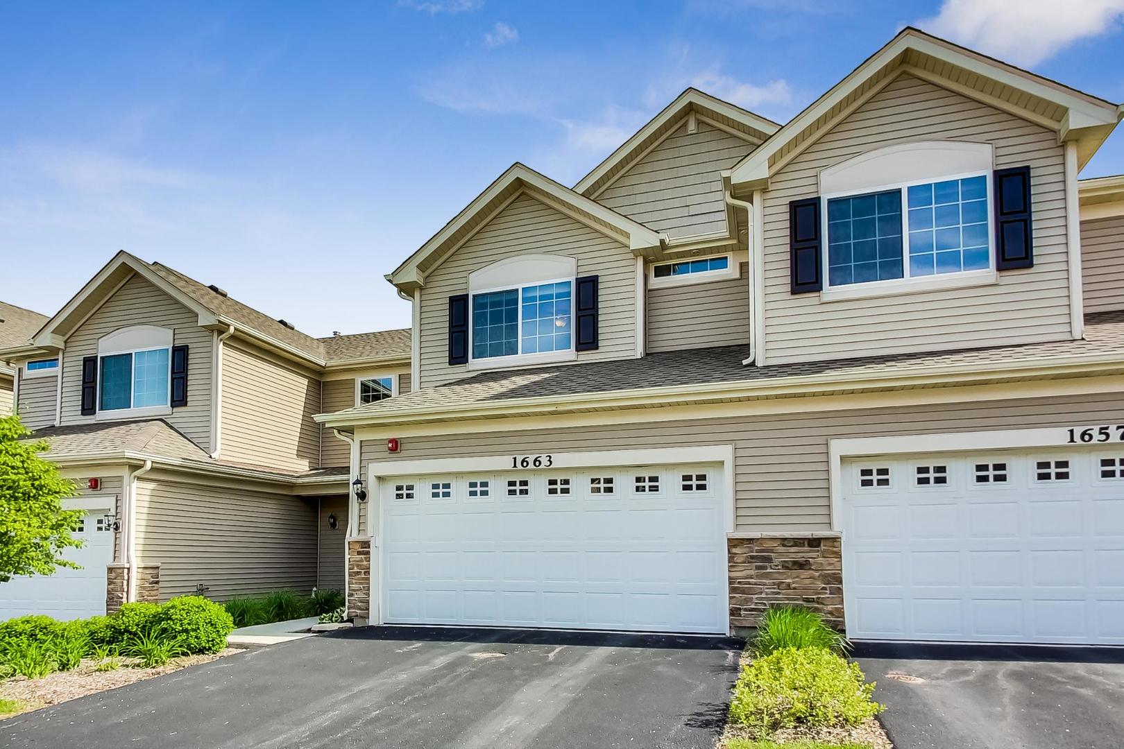 1663 Kraft Avenue Batavia, IL 60510 - Photo 3 of 47 a view of a house with garage