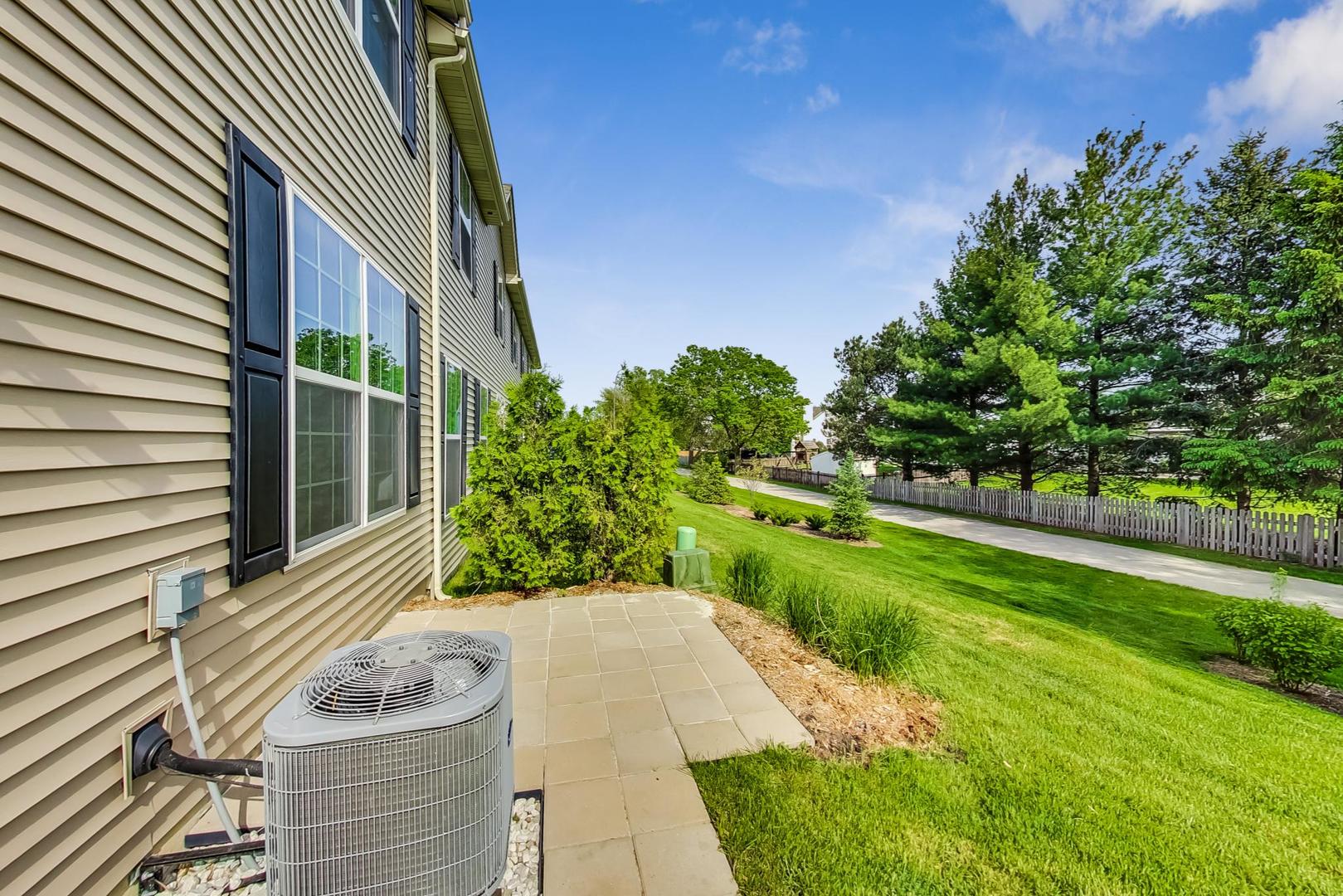 1663 Kraft Avenue Batavia, IL 60510 - Photo 34 of 47 a view of a house with a yard