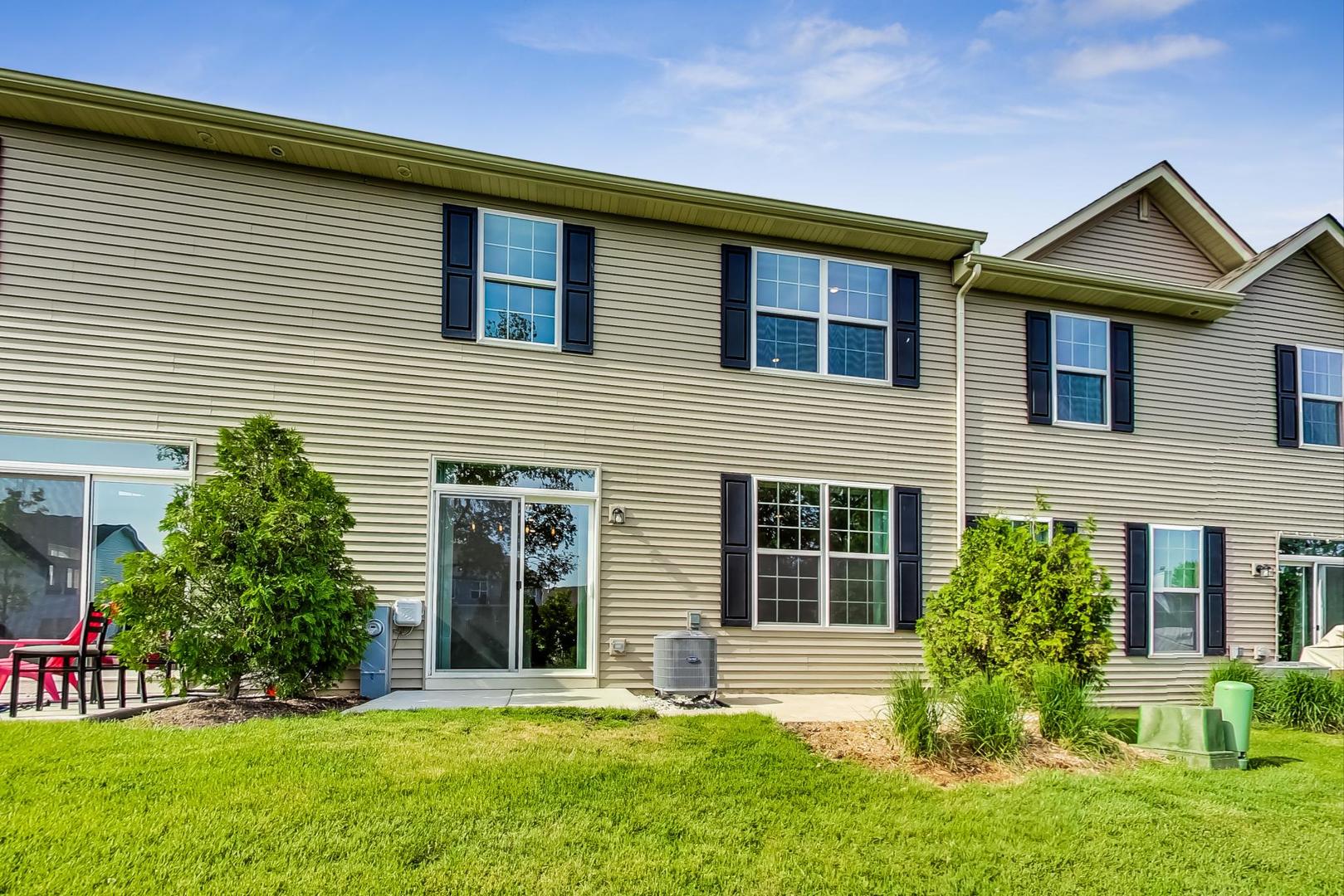 1663 Kraft Avenue Batavia, IL 60510 - Photo 35 of 47 a front view of a house with a yard