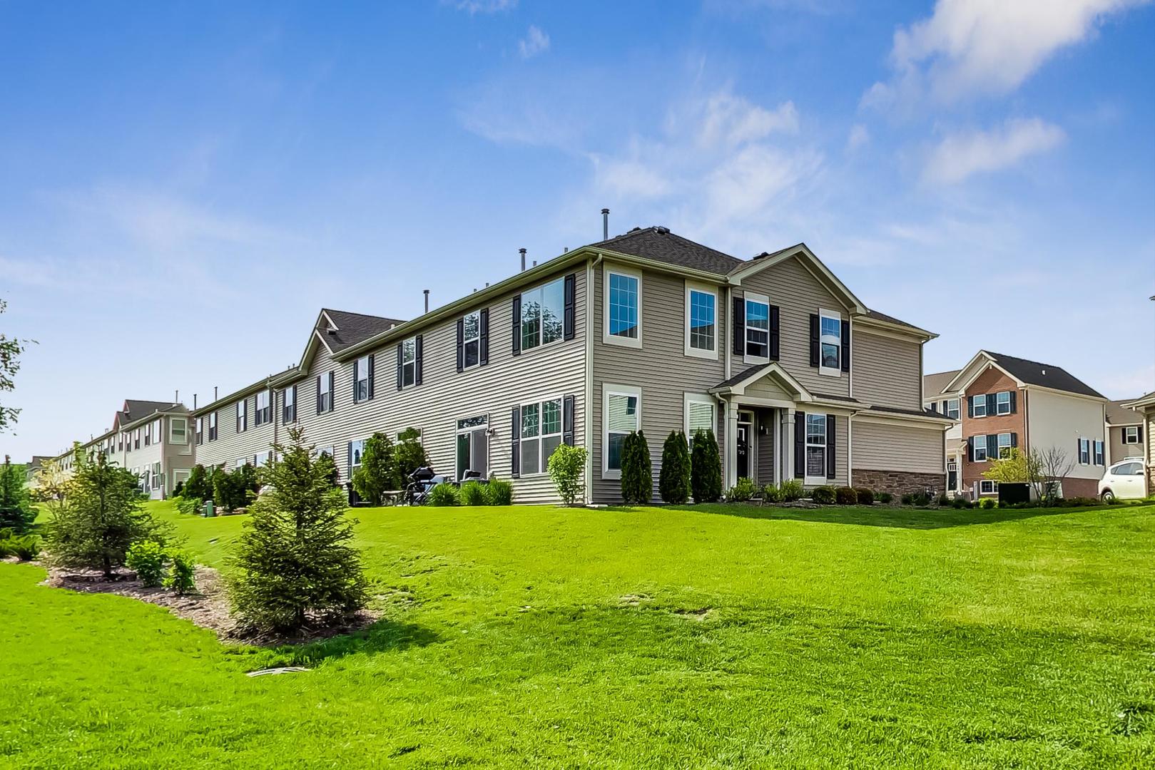 1663 Kraft Avenue Batavia, IL 60510 - Photo 41 of 47 a front view of a house with a yard