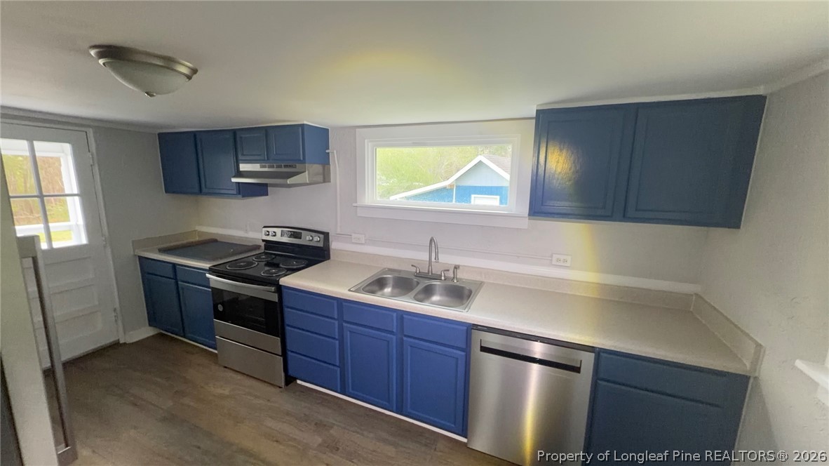 3612 Mt Zion Church Road Mebane, NC 27302 - Photo 19 of 37 a kitchen with stainless steel appliances granite countertop a sink stove and cabinets