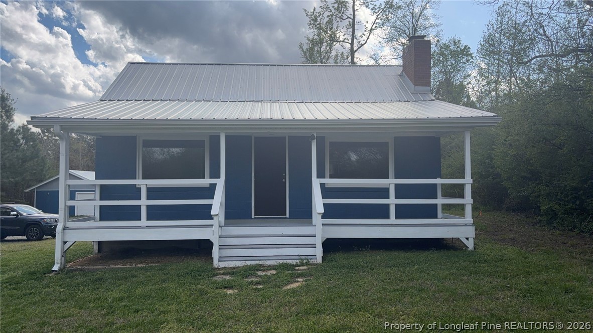 3612 Mt Zion Church Road Mebane, NC 27302 - Photo 2 of 37 a view of a house with a yard and wooden fence
