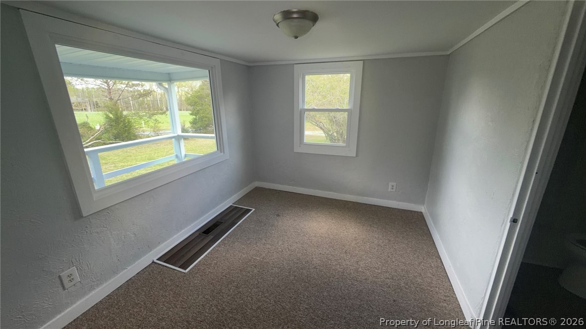 3612 Mt Zion Church Road Mebane, NC 27302 - Photo 21 of 37 an empty room with a window
