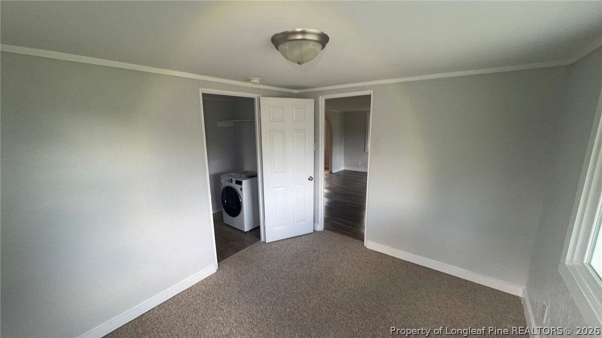 3612 Mt Zion Church Road Mebane, NC 27302 - Photo 22 of 37 a view of a room with closet and wooden door
