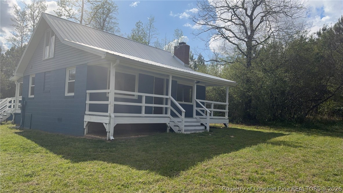 3612 Mt Zion Church Road Mebane, NC 27302 - Photo 5 of 37 a view of a house with backyard and porch
