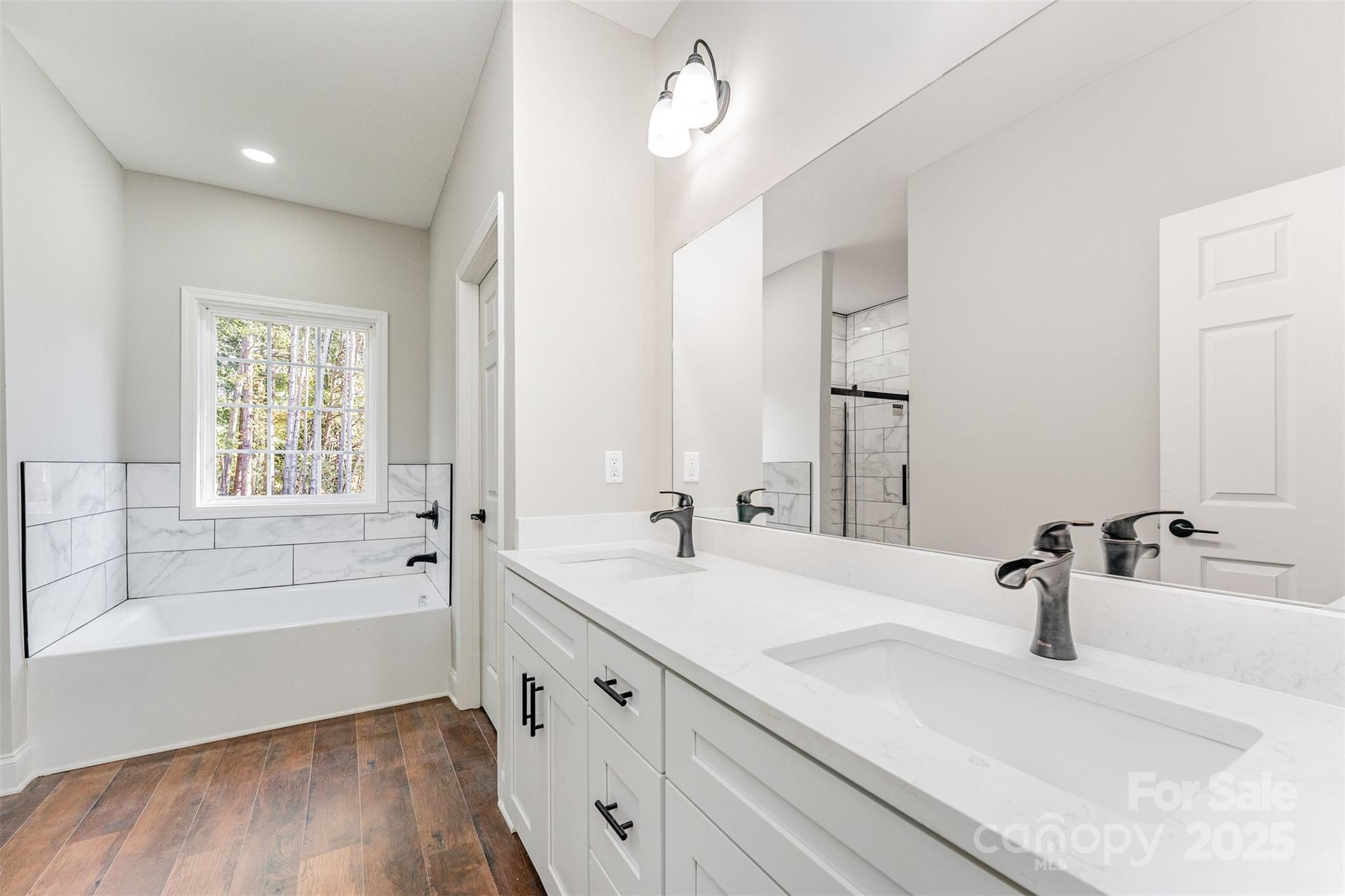 839 Stanley Spencer Mountain Road Gastonia, NC 28056 - Photo 17 of 26 a bathroom with a sink and a bathtub