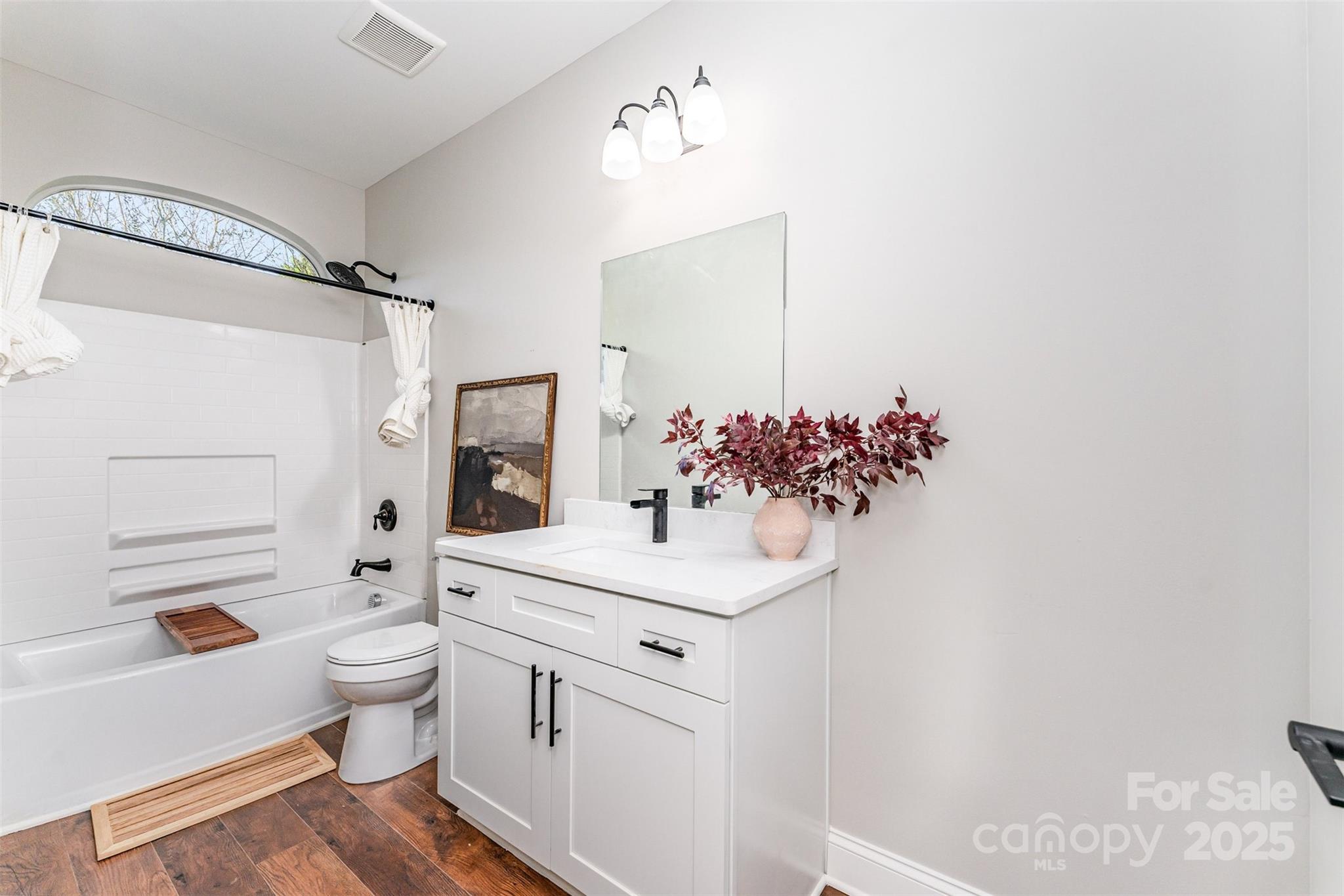 839 Stanley Spencer Mountain Road Gastonia, NC 28056 - Photo 22 of 26 a bathroom with a sink toilet and shower