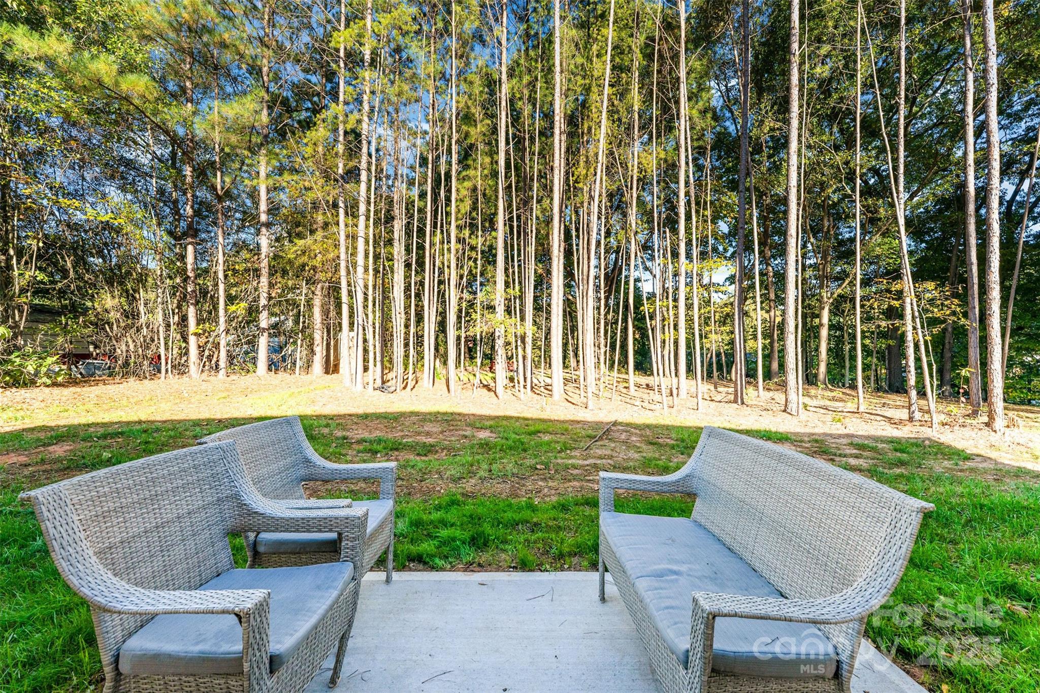 839 Stanley Spencer Mountain Road Gastonia, NC 28056 - Photo 23 of 26 a swimming pool with outdoor seating and yard