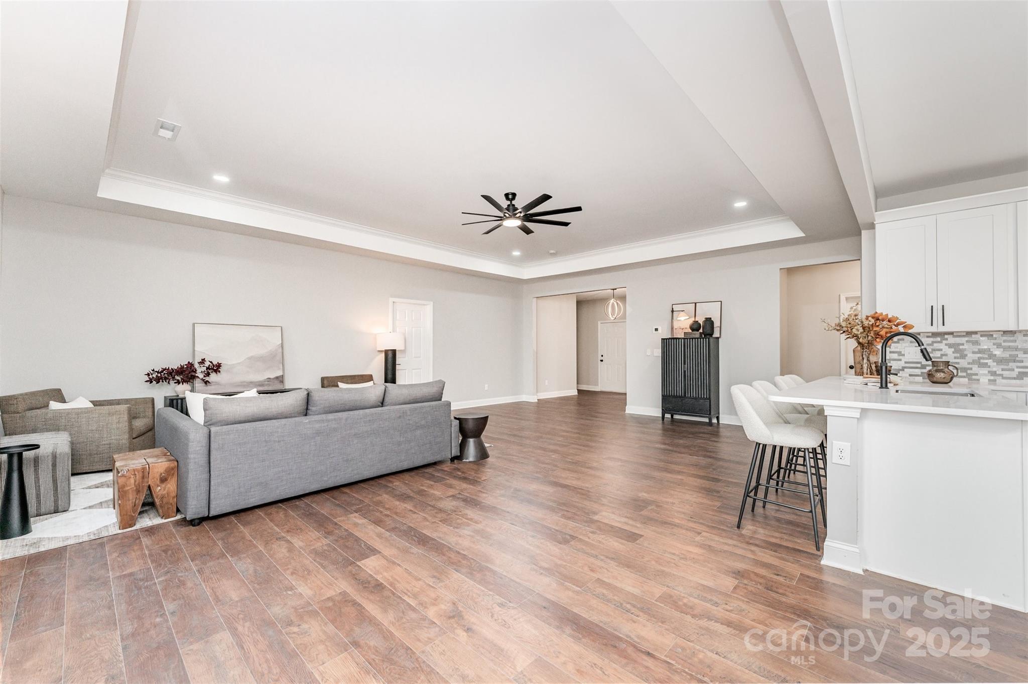 839 Stanley Spencer Mountain Road Gastonia, NC 28056 - Photo 6 of 26 a living room with furniture and a wooden floor