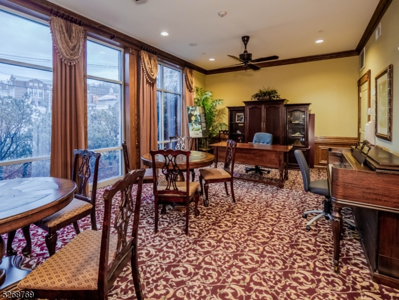 1 Trinity Street, Unit 1 Newton, NJ 07860 - Photo 5 of 5 a view of a dining room with furniture window and outside view