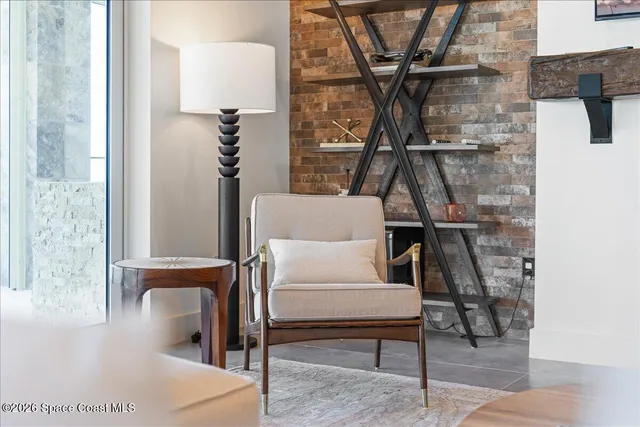 a bedroom with a large bed and a large window