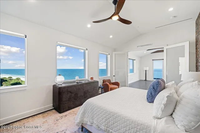 a en suite bathroom with a double vanity sink a mirror and a shower