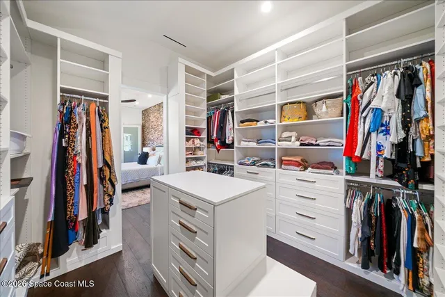a bathroom with a mirror and a sink