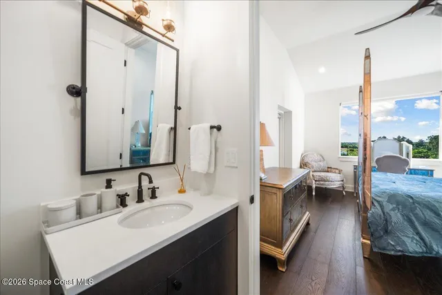 a room with furniture a rug and a window