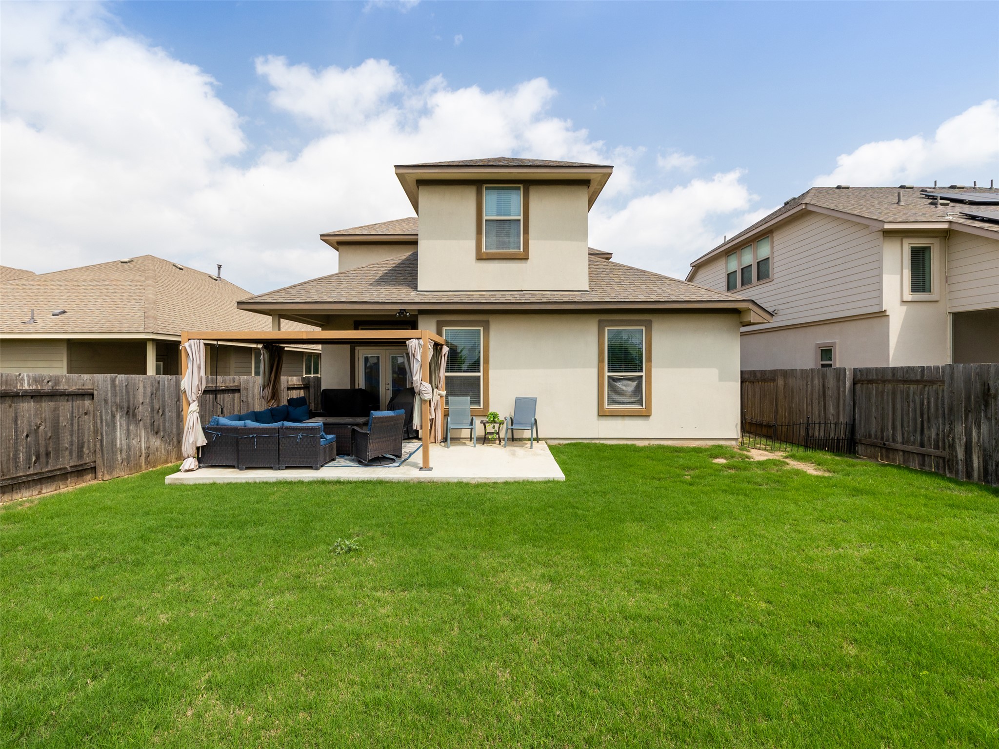 717 Blue Agave Lane Georgetown, TX 78626 - Photo 24 of 28 a view of a house with a yard and sitting area