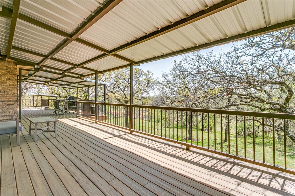 1557 Latigo Hills Road Bartonville, TX 75022 - Photo 32 of 40 View of wooden terrace