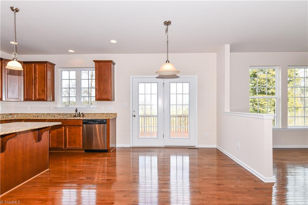 3137 Cranberry Ridge Drive High Point, NC 27265 - Photo 7 of 25 The kitchen boasts a breakfast area for casual dining and has French doors that lead to deck.