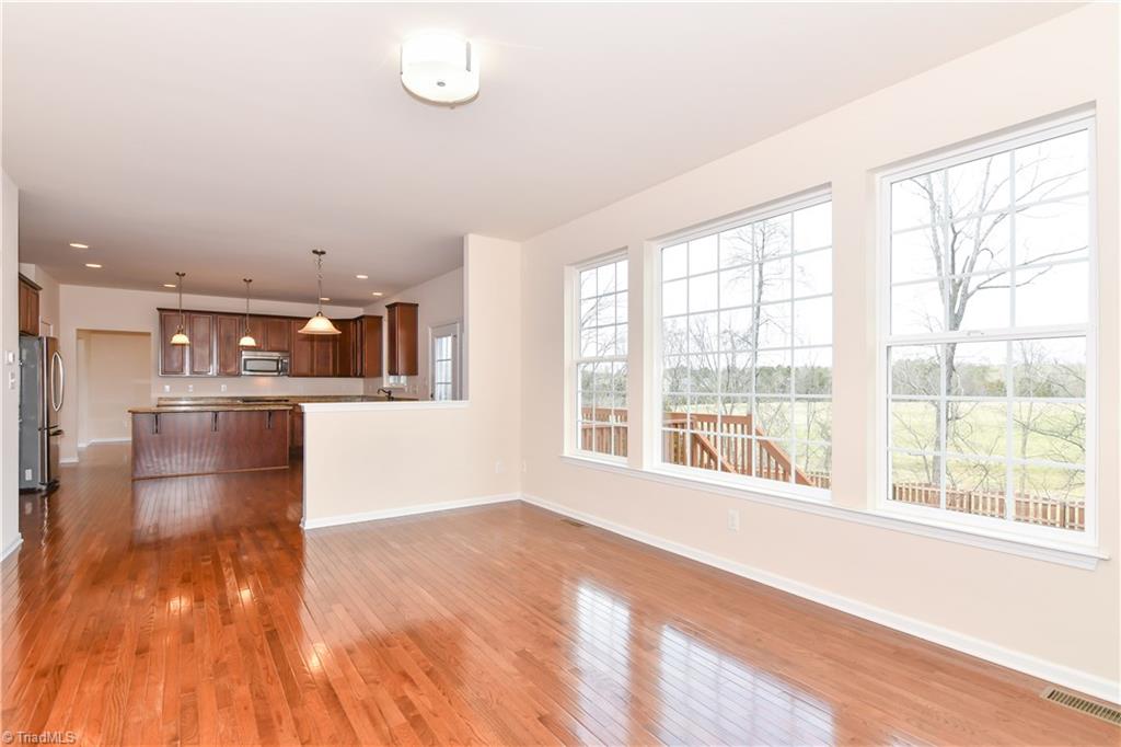 3137 Cranberry Ridge Drive High Point, NC 27265 - Photo 8 of 25 The kitchen opens to the great room, which provides an abundance of natural sunlight!