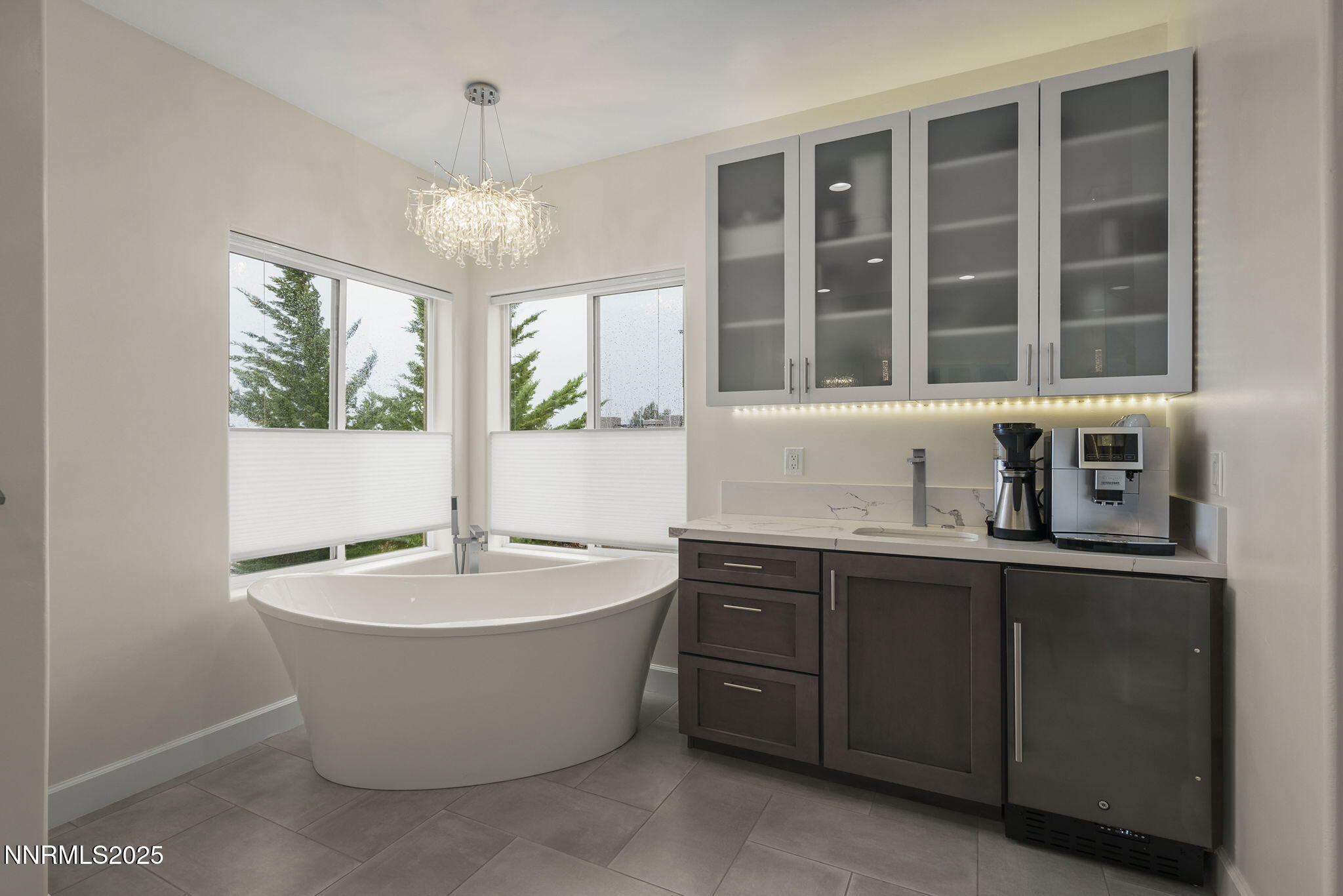 5640 Rue St Tropez Reno, NV 89511 - Photo 23 of 55 a large tub sitting in a bathroom