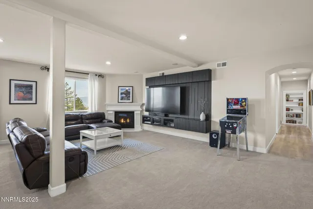 a shelf with books and knick knacks on it