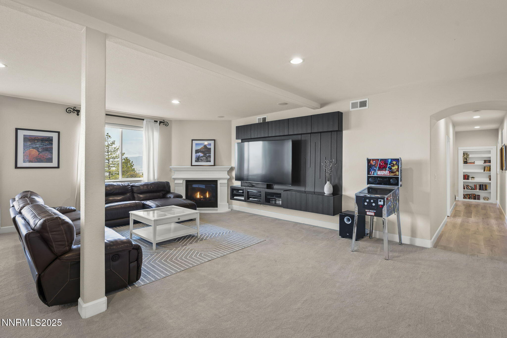 5640 Rue St Tropez Reno, NV 89511 - Photo 29 of 55 a living room with furniture and a flat screen tv