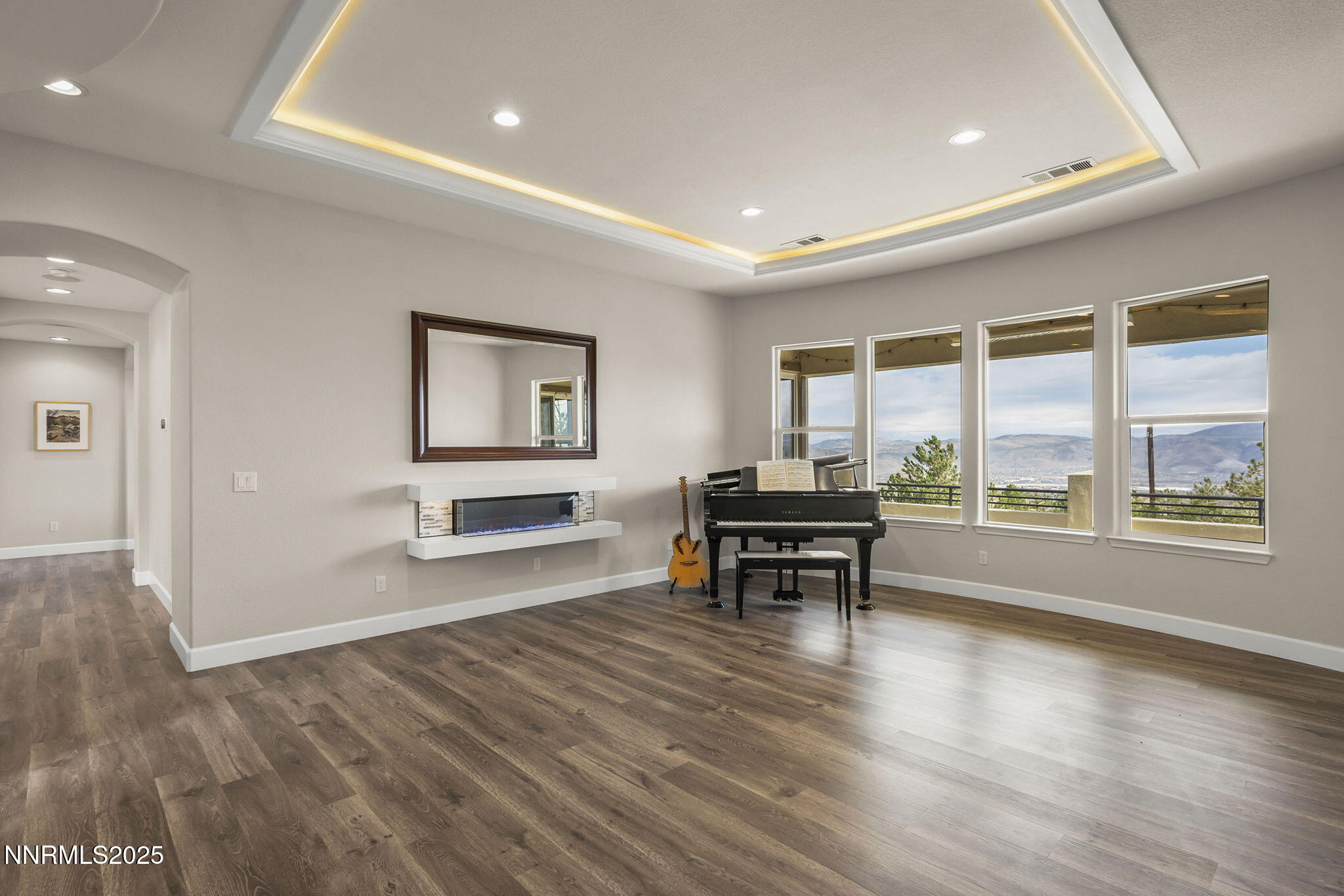 5640 Rue St Tropez Reno, NV 89511 - Photo 3 of 55 a view of a livingroom with furniture window and wooden floor