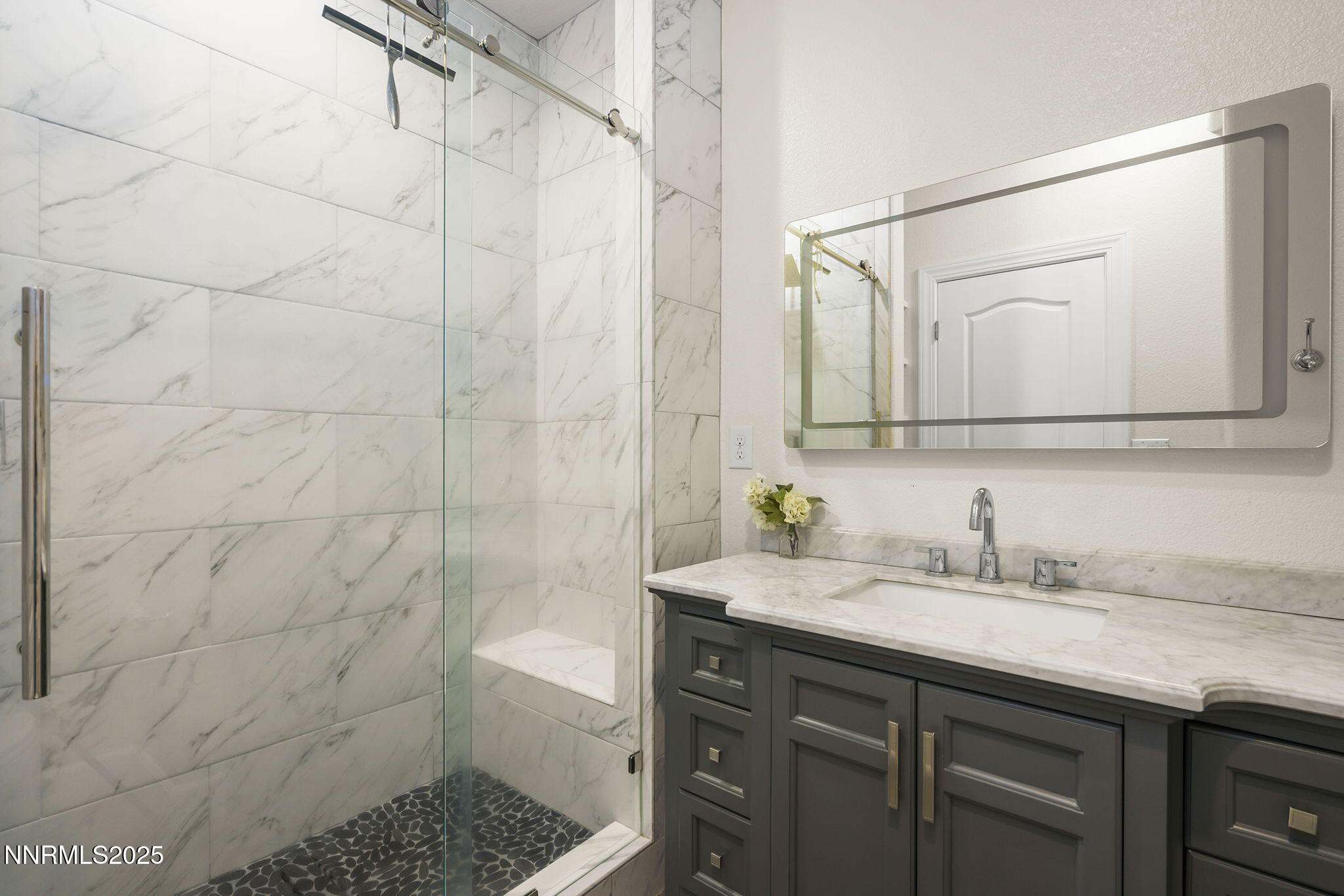 5640 Rue St Tropez Reno, NV 89511 - Photo 34 of 55 a bathroom with a sink a toilet and a mirror