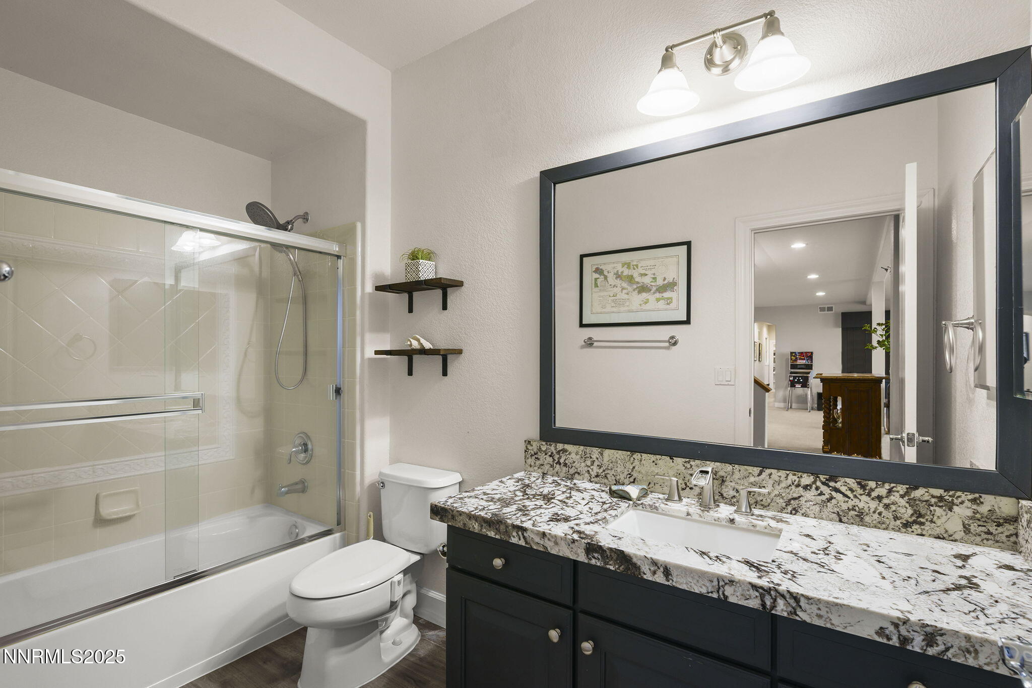 5640 Rue St Tropez Reno, NV 89511 - Photo 36 of 55 a bathroom with a granite countertop sink toilet and shower