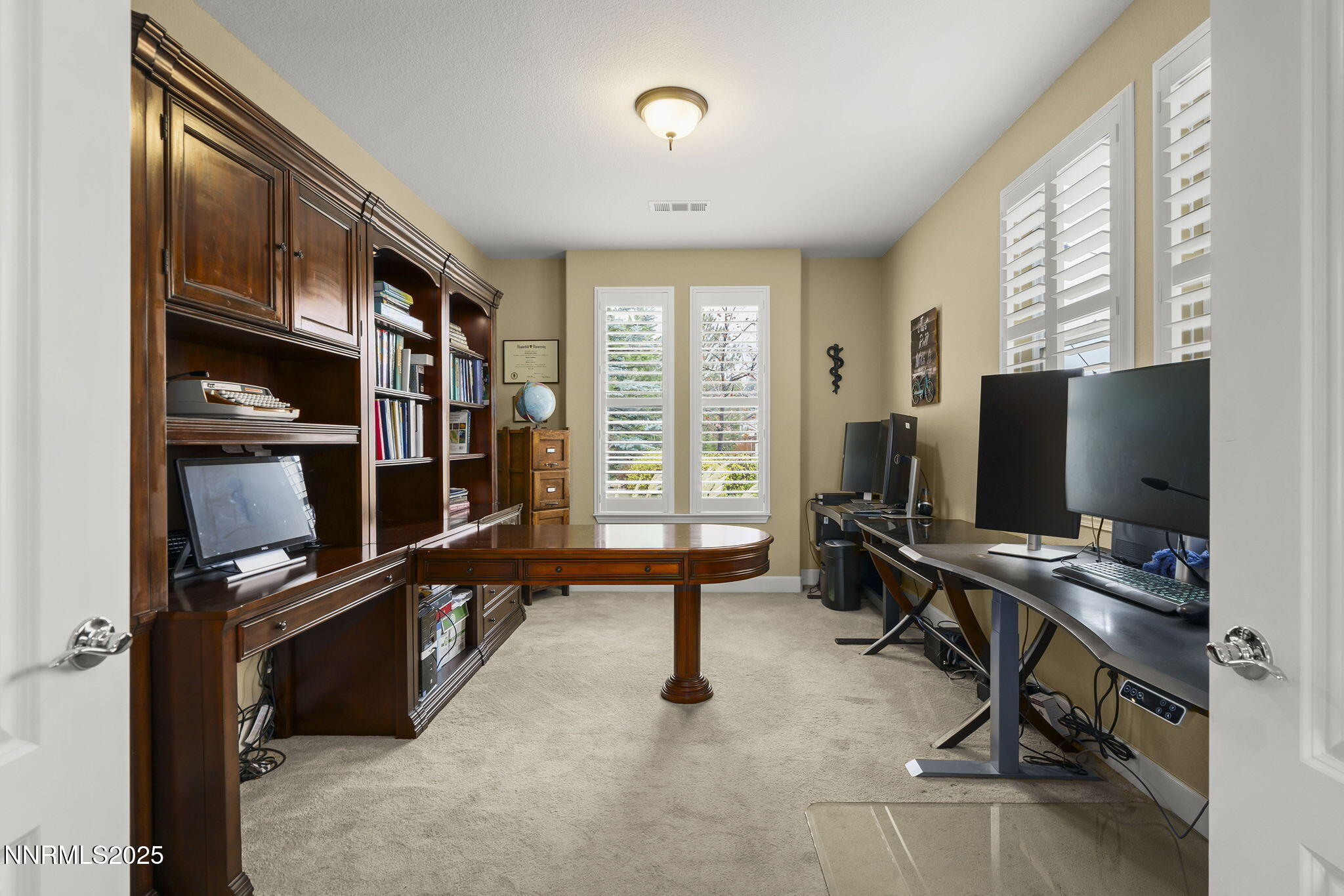 5640 Rue St Tropez Reno, NV 89511 - Photo 37 of 55 a view of a livingroom with workspace and a window